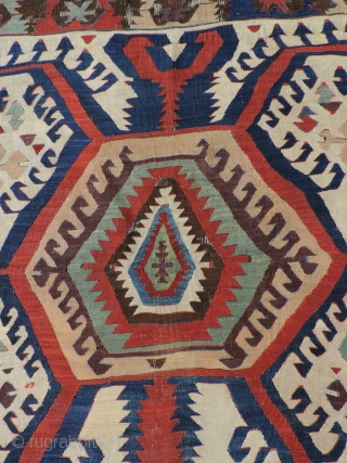 White Ground Anatolian Kilim.  The strong animated design of this old Hotamis kilim is explosive, but well balanced.  There are areas on both selvedges that are intact indicating the piece's  ...