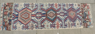 White Ground Anatolian Kilim.  The strong animated design of this old Hotamis kilim is explosive, but well balanced.  There are areas on both selvedges that are intact indicating the piece's  ...