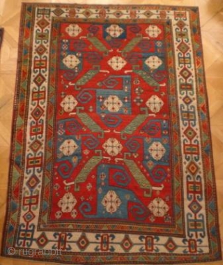 Pinwheel Kazak circa 1850 size 1.75m x 2.40m. A great example of the classic type. See Herrmann 'Asiatische Teppich und Textilkunst' Band 4 plate 40 for a similar example. This one is  ...