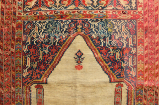 18th century Ghiordes prayer rug. Extremely fine and although there is a large reweave, the rest of it is in pretty good pile. Looks like a cut was made along the bottom  ...