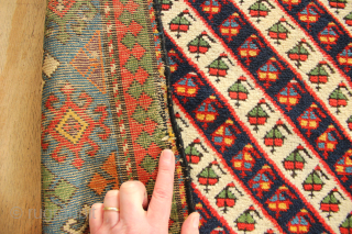 Antique Talish rug with screaming natural dyes. Full pile but renewed sides and three small reweaves and a scattering of minor moth bites. Incredibly saturated dyes, with peach, purple, two greens, two  ...