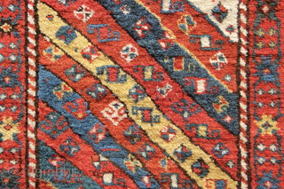 Very fine Kazak in full pile one with large repair that has slightly faded. Beautiful wool and dyes. 3'7" x 7'            