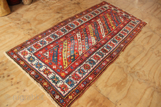 Very fine Kazak in full pile one with large repair that has slightly faded. Beautiful wool and dyes. 3'7" x 7'            