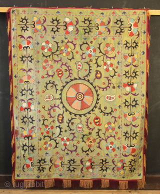 19th century green silk Lakai nim suzani 125 x 161cm / 4'1" x 5'3" in good condition. Some breaks to the silk, to be expected and one hole on the left side ...