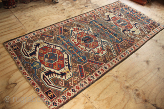 Late 19th century Lenkoran, Caucasus, 128 x 282cm / 4'3" x 9'3" 
Corroded black field has been re-wefted amateurishly but adequately, in places. Ends secured and floor ready. All natural dyes.  