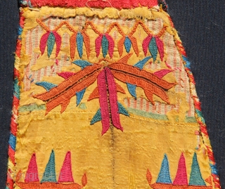 Delightful Yellow silk Chyrpy sleeve fragment, mounted. Frame 13" (at widest point) x 38"                   