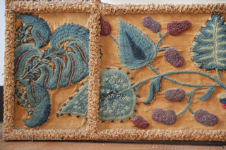 17th/18th century English Crewelwork recycled into a mirror frame in the early part of the 20th century. Makes a great fun object! 2'8" x 2'10" / 82 x 87cm.    