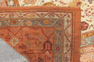 19th century fine antique Oushak carpet, in showroom condition 12'6" x 16'6" with creamy ground colour and abstract floral design in soft colours.          