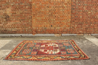 Early 19th century Karachopf Kazak in as found condition. Available as is, until my repairer can come from Turkey- very soon!
5'6" x 7'8" / 167 x 234cm      