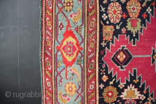 19th century Karabagh Kelleh with cochineal ground colour and marvelously abrashed light blue border. 7' x 20'6" In low pile with minor areas of repiling. Beautiful carpet!      