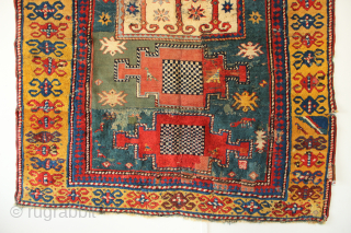 19th century Kazak fragment. In need of some TLC, priced accordingly. Great and dramatic display piece! 4'10" x 5'5"              