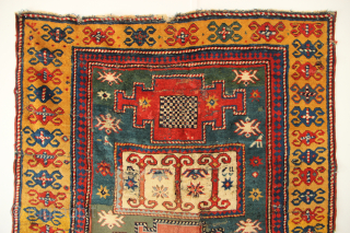19th century Kazak fragment. In need of some TLC, priced accordingly. Great and dramatic display piece! 4'10" x 5'5"              