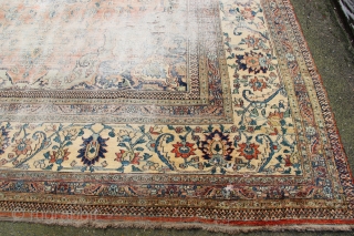 Doroksh carpet, circa 1900, Central Iran in worn condition. 344 x 452cm / 11'4" x 14'9"                 