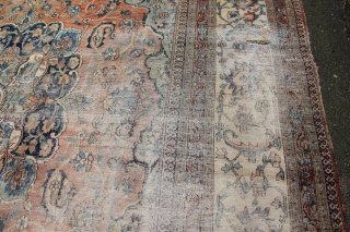 Doroksh carpet, circa 1900, Central Iran in worn condition. 344 x 452cm / 11'4" x 14'9"                 