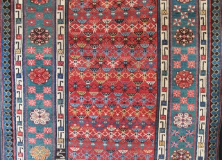 Talish area Caucasian rug dated 1879. In showroom condition (ie minor restoration) there is even low pile allover, and warm, attractive colour, particularly the abrashed green border. 4'1" x 7'10"   