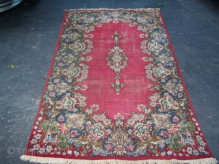 ok this is an nice old handmade kerman rug i believe 1920's or 30's .
nice rug does have wear in field of rug . 

rug size is 6ft 8in x 3ft 9  ...