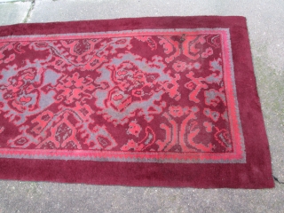 British rug, maroon ground with skeletal design in maroon, maroon-rose and grey; interesting 'neutral' colour palette which is very evocative of the rug's early 20th.century period, (slight 'fleecy' side-to-side band at far  ...