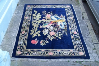 Chinese Carpet, (main image is from the back) early 20th.century, has some synthetic colours and (I count) five patch repairs, otherwise pile in reasonable condition, replaced side selvages, 180 x 276cm  