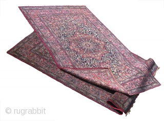 A good pair of early 20th.century Isfahan rugs, each with a principal colour combination of rose red, ivory and indigo with details in pink, blue, pale blue, ocre and green, nice condition  ...