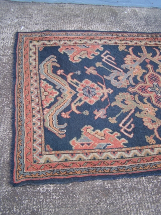 Ushak Oushak rug, fairly 'late' example with blue ground, some wear, some colour fading.                   