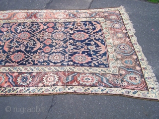 A fragmentary North-West Persian carpet, the surviving sections of what must have been an impressive pair of large pattern herati carpets. Although in a reworked state, this carpet still retains great presence  ...