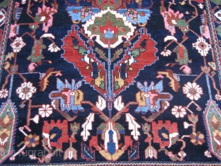 Bahktiari directional design rug 4' 9" x 6' 4".

At least I think it's a Bahktiari - I'm open to suggestions...  Whatever it is, it's wild!  Vivid color and a design  ...
