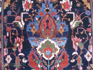 Bahktiari directional design rug 4' 9" x 6' 4".

At least I think it's a Bahktiari - I'm open to suggestions...  Whatever it is, it's wild!  Vivid color and a design  ...