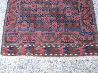 Belouch 3' 3" x 5' 5".
Probably circa 1920 or earlier.  Even low pile with the usual corrosion in the brown (see photos).  The glory of this little rug is the  ...