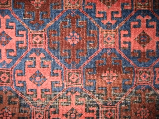 Belouch 3' 3" x 5' 5".
Probably circa 1920 or earlier.  Even low pile with the usual corrosion in the brown (see photos).  The glory of this little rug is the  ...
