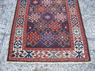 Belouch 2' 11" x 5' 8".

Not sure how to identify this one.  It has elements of both Belouch and Kurdish (Quchan?) weaving.  Low-ish even pile, ends are intact, with one  ...