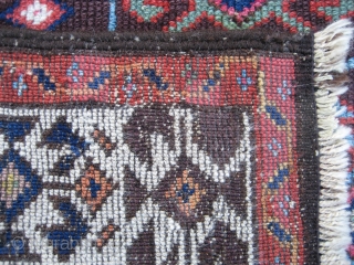 Belouch 2' 11" x 5' 8".

Not sure how to identify this one.  It has elements of both Belouch and Kurdish (Quchan?) weaving.  Low-ish even pile, ends are intact, with one  ...