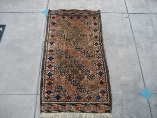 Belouch 2' 6" x 4' 9" in nice condition.  Full pile condition end-to-end.  The rug had been hanging for many years and still has 5 brass rings attached.  The  ...
