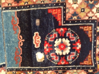 Tibetan Saddle Rug from late 19 century.  Purchased originally from Xanadu Gallery in San Francisco with verified authenticity.  Excellent condition.           