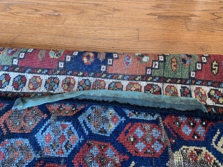 Botehs for days and days on this brightly colored 19th Ca Luri rug!

Measuring 7'10"x3'9" the rug shows signs of wear in some areas.  Repairs to selvages only.  Tear in one  ...