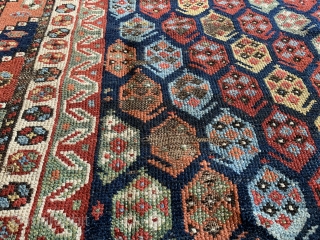 Botehs for days and days on this brightly colored 19th Ca Luri rug!

Measuring 7'10"x3'9" the rug shows signs of wear in some areas.  Repairs to selvages only.  Tear in one  ...