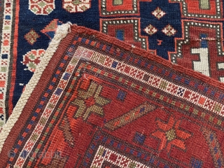 19th Ca Kazak weave with Leshghi star
Old Repairs.  Colors Bright and sound.
5'3"x3'1"                    