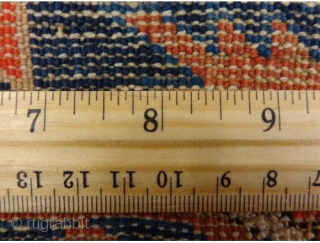 http://jessiesrugs.com/caucasian-rugs/518-caucasian-oriental-rug-4-1-x-6-1-blue-kuba.html

This antique Caucasian Kuba rug is in fair condition. The design features an all-over snowflake pattern set in a blue field with ivory, red and brown highlights. There is moderate wear on  ...