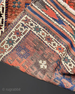 Antique Baluch. Saturated color in a wide palette on a ground of burnt-umber, largely undyed wool. In high pile with the exception of some slightly corroded browns. The gloss of ...