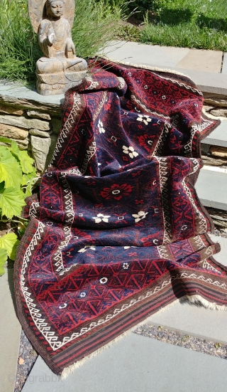 Antique Mina Khani Baluch. 254cm x 90 cm (8'3" x 3') Cherry red and deep navy blue. Unusual borders with long knotted elems.  Camel wefts.  Corroded blacks in the border.  ...