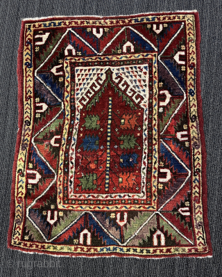Crippled late 19th century, West Anatolian prayer rug. 3' x 4' (90cm x 120cm). A few darned holes and other repairs as evidenced by the expandable photos. A bit of fucsine. $200 ...