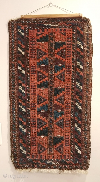 Antique Baluch balisht.  Fair condition with corroded browns, considered in the price.  Familiar, totemic design with striking presence and uncommonly good, saturated dyes.  Rust red, electric and navy blues,  ...