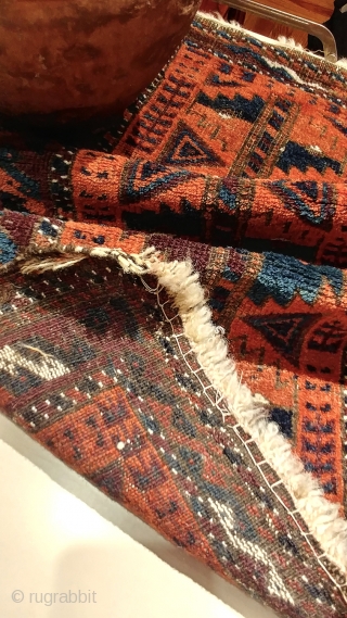 Antique Baluch balisht.  Fair condition with corroded browns, considered in the price.  Familiar, totemic design with striking presence and uncommonly good, saturated dyes.  Rust red, electric and navy blues,  ...