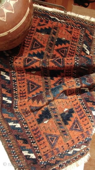 Antique Baluch balisht.  Fair condition with corroded browns, considered in the price.  Familiar, totemic design with striking presence and uncommonly good, saturated dyes.  Rust red, electric and navy blues,  ...