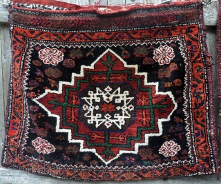 Pair of Kuhi Afshar bags. Original complete khorjin has been separated. Lush, full pile and saturated colors. Each bag is 32" x 37" (81 x 68 cm). Unusual piled closure tabs. Nice. 