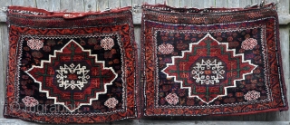 Pair of Kuhi Afshar bags. Original complete khorjin has been separated. Lush, full pile and saturated colors. Each bag is 32" x 37" (81 x 68 cm). Unusual piled closure tabs. Nice. 