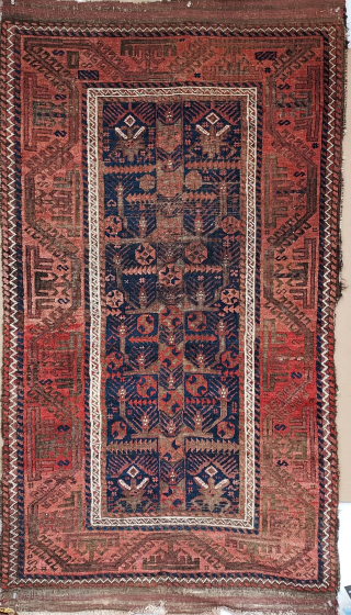 Antique Baluch, unusual Tree & Garden design, 36 x 64 inches. Slight losses at sides. Corroded browns. Recently hand-washed.  USD 375.- jbatki@twcny.rr.com          