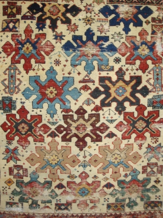 Shirvan 15 Snowflake Stars on Ivory. A 19th century prayer rug of petite dimensions. Camel hair and wool, some cotton weft. Numerous small holes and nicks, no restorations. A battle-scarred veteran of  ...
