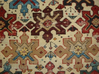 Shirvan 15 Snowflake Stars on Ivory. A 19th century prayer rug of petite dimensions. Camel hair and wool, some cotton weft. Numerous small holes and nicks, no restorations. A battle-scarred veteran of  ...