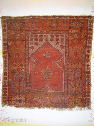 Early Milas prayer rug, petite 102x105 cm. Possibly 18th century. Please inquire for detailed condition report.                 