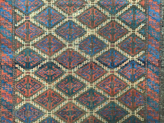 Antique Baluch small rug: Geometric Gul motif in Diamond Lattice repeat with crisp camel hair stepped outline. 33 x 58 inches.  Brilliant blues. Very good condition. Inexpensive. johnbatki@gmail.com    